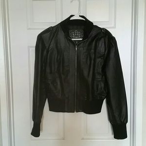 Super cute bomber style faux leather jacket