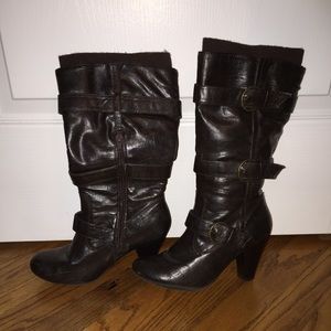 Heeled boots with attached boot sock.