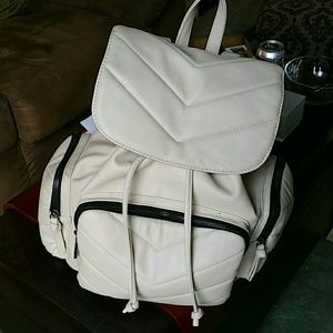 Like new Steve madden beige backpack