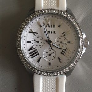 FOSSIL white rubber band watch. Batteries are good
