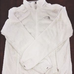 fuzzy white North Face zip up