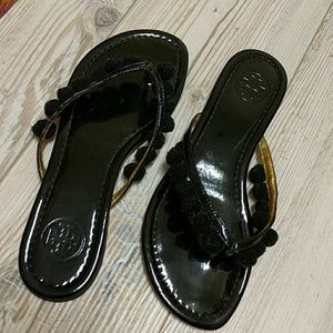 Tory Burch patent leather thongs with pom poms
