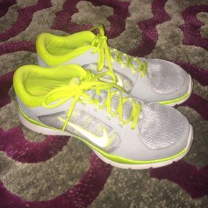 Ladies size 9.5 Nike gray/neon cross trainers