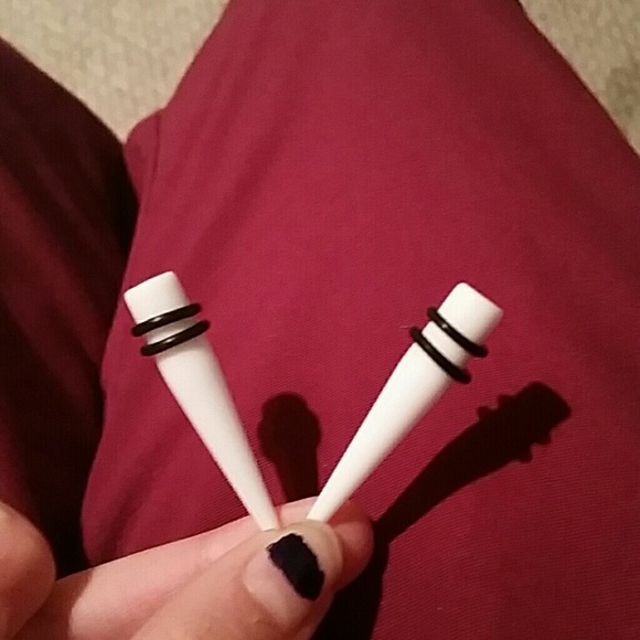 Size 0 tapers and plugs from Hot Topic.