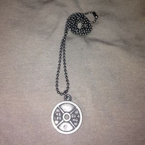 45lb/ 20.4kg charm necklace.