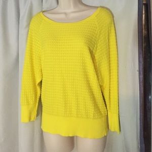 Bright yellow lightweight sweater.