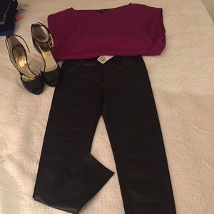 NWT black faux leather leggings.