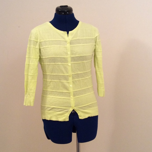 Yellow cardigan.