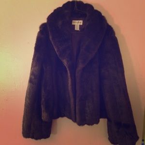 This is a Faux Fur. This jacket is a size (M)