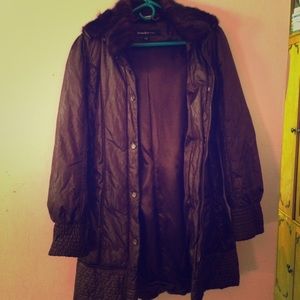 This is a designer coat with a mink hood.