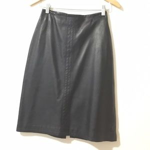 Barney's black leather skirt