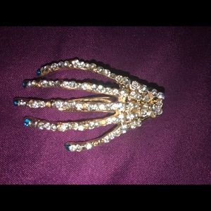 Rhinestone skeleton hand hair accessory