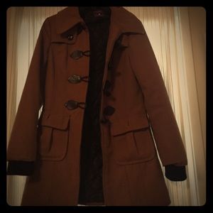 Tan pea coat with black details