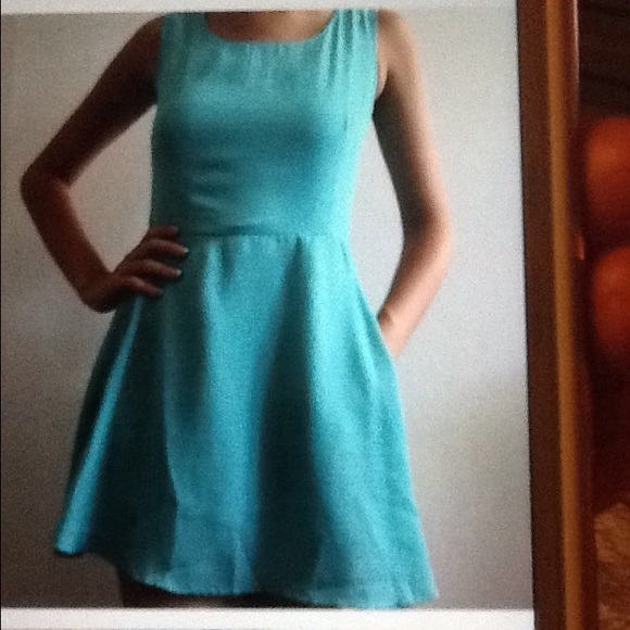 Tiffany green sleeveless Romper. - Picture 1 of 4