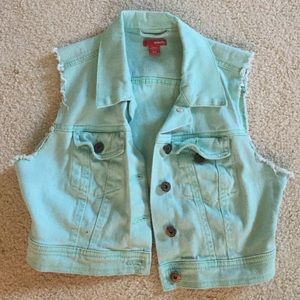 Cute, short vest brand new; never worn