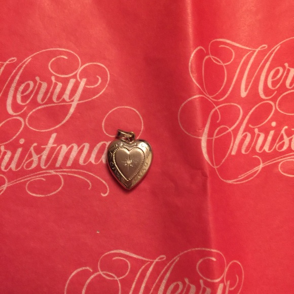 Sterling silver heart necklace with one diamond