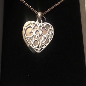 God is love necklace. Never worn. Still in box