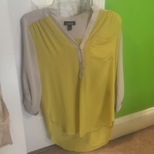 Thin blouse yellow and cream colored