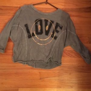 Grey sweatshirt with black and gold detail