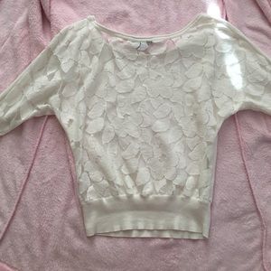 American Eagle cream colored top with lace back