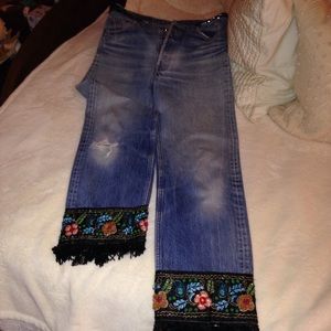 Buzz hand beaded jeans.