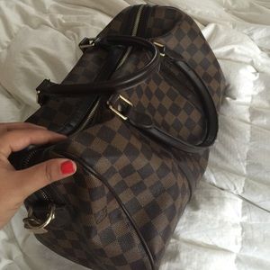 Brown checkered speedy bag