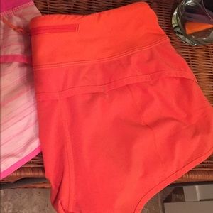 Lululemon 4-Way Stretch Orange Speed Shorts