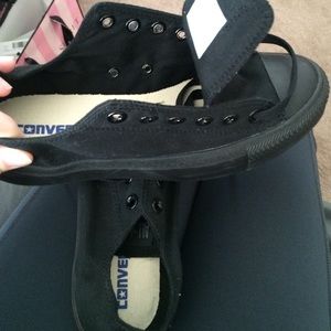 Brand new never worn black low top converse