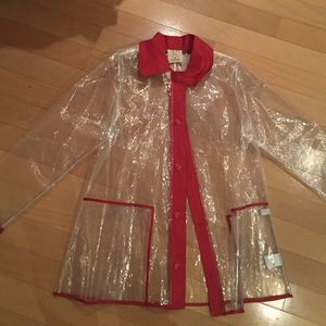 Clear raincoat with red accent
