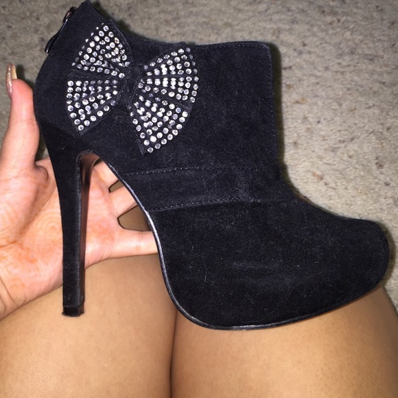 Black suede bow heels