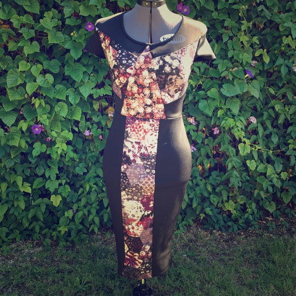 Black Dress with Flower and Netting Detail.