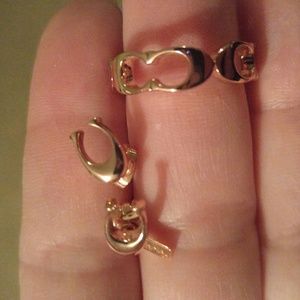 Coach earrings rose color
