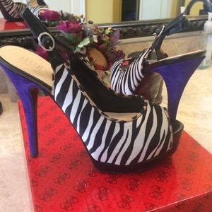 Zebra print multi-satin Guess stilettos.