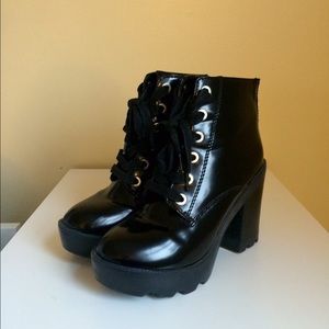 Black patent lace up heeled boots
