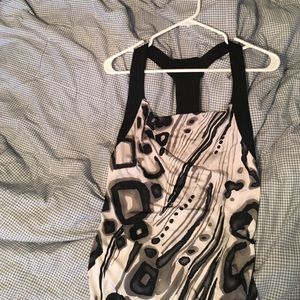 Silky club dress, thigh length, fitted at thigh