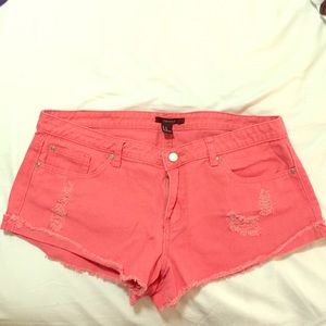 Salmon colored jean shorts