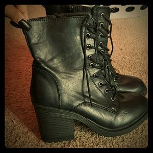 All black lace up leather boots