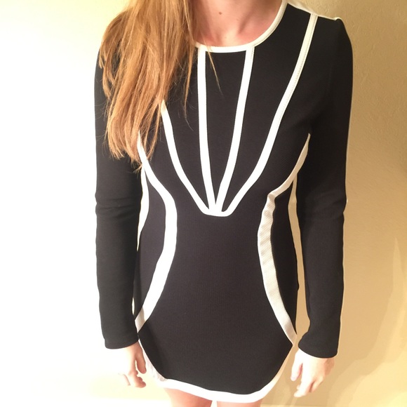 Long sleeve black mini dress.