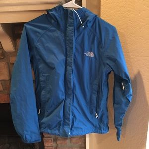 Blue Northface rain jacket.