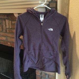 Purple Northface running jacket.