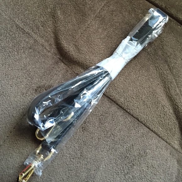Michael Kors black handbag strap.