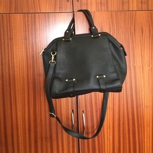 Black BP leather purse with gold accents