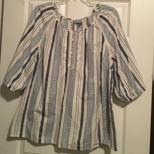 Cute top.  Perfect with jeans or capris.