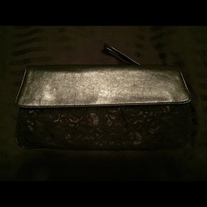 Black Charlotte Russe lace and leather clutch