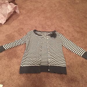 Striped cardigan with rose on the collar