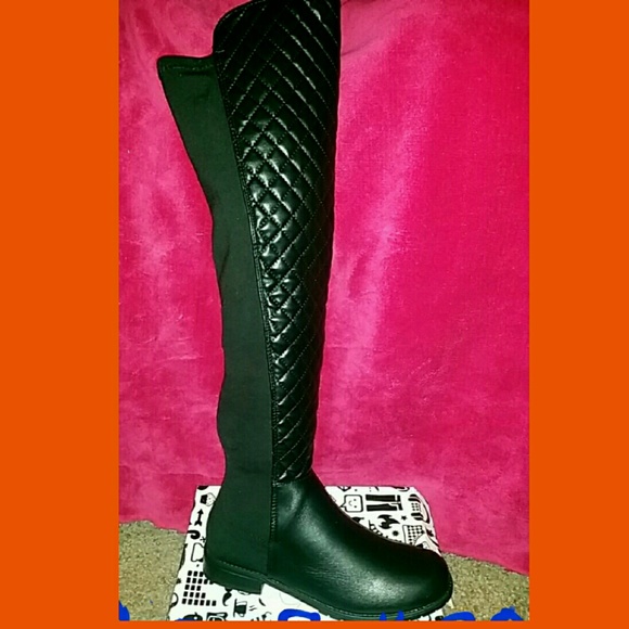 Tall black over the knee boots