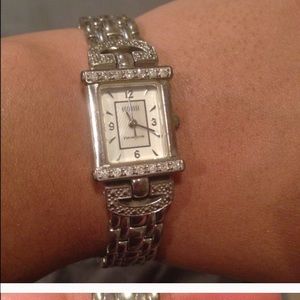 Sterling silver watch.. With accent diamonds