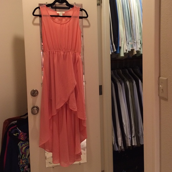 Peach hi low dress 100% polyester.