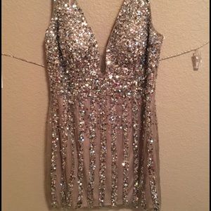 A short , blingy prom or homecoming dress💓