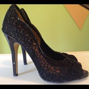 Black lace pumps